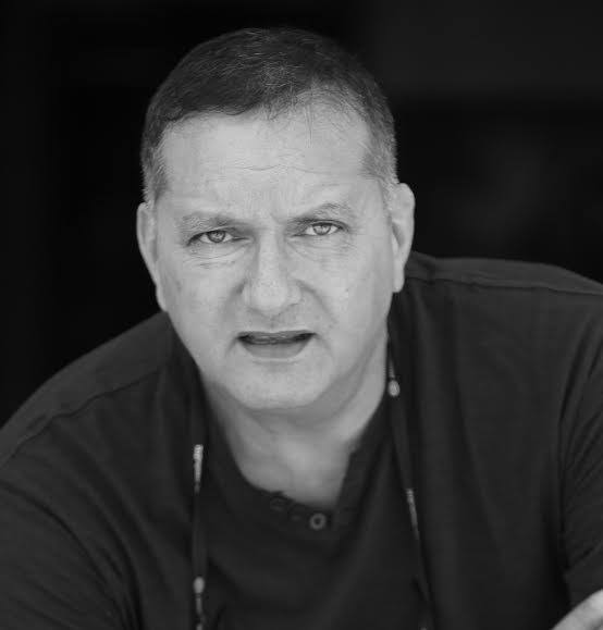 אורי עזר | סופר | אודות